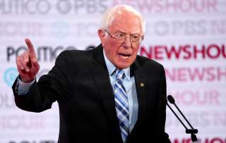 FILE PHOTO: Senator Bernie Sanders speaks during the sixth 2020 U.S. Democratic presidential candidates campaign debate at Loyola Marymount University in Los Angeles, California, U.S., December 19, 2019. REUTERS/Mike Blake/File Photo