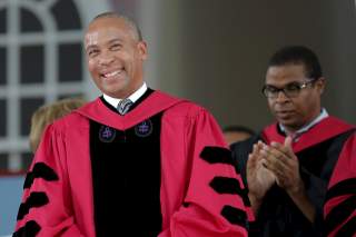 Former Massachusetts Governor Deval Patrick stands to receive an honorary Doctor of Laws degree during the 364th Commencement Exercises at Harvard University in Cambridge, Massachusetts May 28, 2015. REUTERS/Brian Snyder