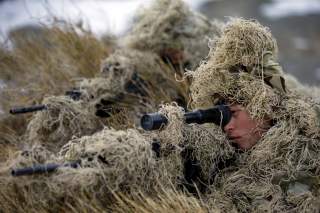 Soldiers of the People's Liberation Army (PLA) Marine Corps are seen in training at a military training base in Bayingol, Xinjiang Uighur Autonomous Region, January 20, 2016. REUTERS/Stringer 