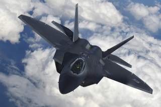 A U.S. F-22 Raptor fighter flies over European airspace during a flight to Britain from Mihail Kogalniceanu air base in Romania April 25, 2016. REUTERS/Toby Melville