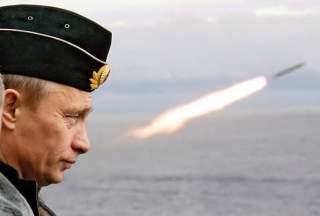 Russian President Putin watches the launch of a missile during naval exercises in Russia's Arctic North on board the nuclear missile cruiser Pyotr Veliky. Russian President Vladimir Putin watches the launch of a missile during naval exercises in Russia's 