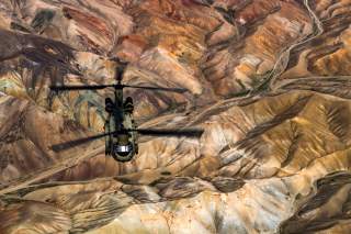 A U.S. Army Task Force Brawler CH-47F Chinook conducts a training exercise at Bagram Airfield, Afghanistan, March 26, 2018. Picture taken March 26, 2018. U.S. Air Force/Tech. Sgt. Gregory Brook/Handout via REUTERS. 