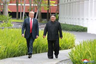 U.S. President Donald Trump walks with North Korean leader Kim Jong Un at the Capella Hotel on Sentosa island in Singapore in this picture released on June 12, 2018 by North Korea's Korean Central News Agency. KCNA via REUTERS ATTENTION EDITORS - THIS PIC