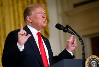 U.S. President Donald Trump addresses a meeting of the National Space Council in the East Room of the White House in Washington, U.S., June 18, 2018. REUTERS/Leah Millis