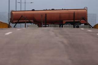 Fuel tank blocks the vehicular passage on Tienditas cross-border bridge between Colombia and Venezuela, in Cucuta, Colombia, February 6, 2019. REUTERS/Luisa Gonzalez