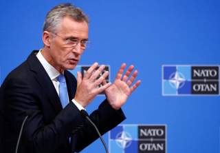 NATO Secretary General Jens Stoltenberg addresses a news conference during a NATO defence ministers meeting at the Alliance headquarters in Brussels, Belgium February 14, 2019. REUTERS/Francois Lenoir