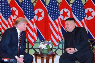 North Korea's leader Kim Jong Un and U.S. President Donald Trump speak during the second U.S.-North Korea summit in Hanoi, Vietnam, in this photo released on February 28, 2019 by North Korea's Korean Central News Agency (KCNA). KCNA via REUTERS ATTENTION 