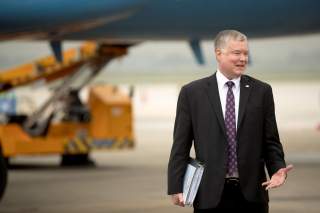 U.S. Special Representative for North Korea Stephen Biegun, stands on the tarmac as U.S. Secretary of State Mike Pompeo (not pictured) boards his plane at Nom Bar International Airport in Hanoi, February 28, 2019. Andrew Harnik/Pool via REUTERS