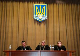 Judges attend a court hearing on appeal to annul comedian Volodymyr Zelenskiy's registration as presidential candidate in upcoming election in Kiev, Ukraine April 20, 2019. REUTERS/Vasily Fedosenko