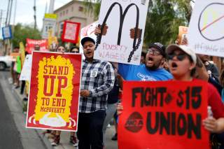 Striking McDonalds workers demanding a $15 minimum wage demonstrate in Las Vegas, Nevada U.S., June 14, 2019. REUTERS/Mike Segar