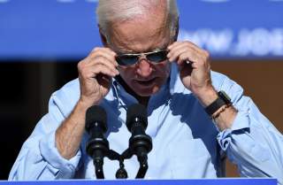 Democratic U.S. presidential candidate and former Vice President Joe Biden adjusts his glasses as he speaks at a community event in Las Vegas, Nevada, U.S., September 27, 2019. REUTERS/David Becker