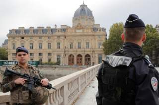 French police secure the area in front of the Paris Police headquarters in Paris, France, October 3, 2019. REUTERS/Philippe Wojazer