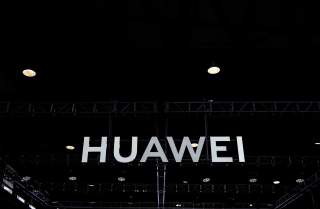 A Huawei company logo is seen at CES (Consumer Electronics Show) Asia 2019 in Shanghai, China June 11, 2019. REUTERS/Aly Song