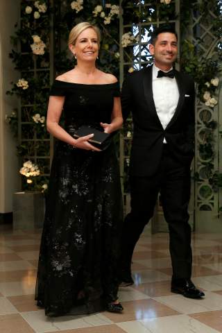 FILE PHOTO: U.S. Secretary of Homeland Security Kirstjen Nielsen and Chad Wolf arrive for the State Dinner in honor of French President Emmanuel Macron at the White House in Washington, U.S., April 24, 2018. REUTERS/Joshua Roberts/File Photo