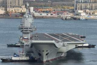 China's first domestically built aircraft carrier departs the port for its ninth sea trial in Dalian, Liaoning province, China November 14, 2019. Picture taken November 14, 2019. REUTERS/Stringer