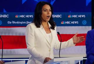 Democratic presidential candidate Rep. Tulsi Gabbard speaks during the fifth 2020 campaign debate at the Tyler Perry Studios in Atlanta, Georgia, U.S., November 20, 2019. REUTERS/Brendan McDermid