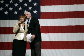 Republican Senate candidate Sharron Angle (L) introduces U.S. Senator John McCain (R-AZ) during a campaign rally at the Orleans hotel-casino in Las Vegas, Nevada October 29, 2010. REUTERS/Las Vegas Sun/ Sam Morris