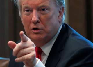 U.S. President Donald Trump speaks during a meeting to 