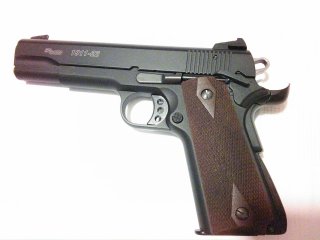 Image: Sig Sauer 1911-22, side view. Wikimedia/Postivoli. Creative Commons Attribution-Share Alike 3.0 Unported license.