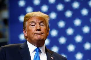 U.S. President Donald Trump pauses during address at campaign rally at Mohegan Sun Arena in Wilkes-Barre, Pennsylvania, U.S., August 2, 2018. REUTERS/Leah Millis