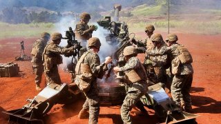 U.S. Marines Firing Artillery