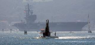 Swedish Stirling engine-powered attack submarine HMS Gotland transits through San Diego Harbor with the Nimitz-class aircraft carrier USS Ronald Reagan (CVN 76) following close behind during the “Sea and Air Parade” held as part of Fleet Week San Diego 20