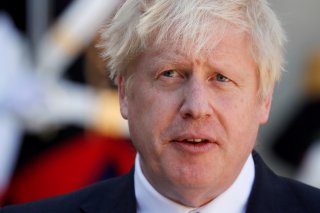 FILE PHOTO: British Prime Minister Boris Johnson delivers a joint statement with French President Emmanuel Macron (not seen) before a meeting on Brexit at the Elysee Palace in Paris, France, August 22, 2019. REUTERS/Gonzalo Fuentes/File Photo