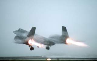 A U.S. Air Force Lockheed SR-71A Blackbird taking off from a fog-shrouded runway. The SR-71 was flown by Det. 4, 9th Strategic Reconnaissance Wing, 3rd Air Force, RAF Mildenhall (UK).