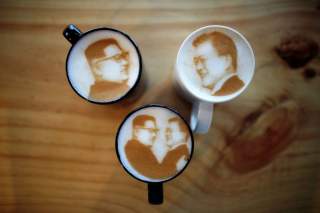 Pictures of North Korean leader Kim Jong Un and South Korean President Moon Jae-in are printed on top of milk foam of lattes at a coffee shop in Jeonju, South Korea, June 1, 2018. Picture taken June 1, 2018. REUTERS/Kim Hong-Ji