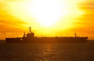 The aircraft carrier USS George Washington (CVN 73) steams through the South China Sea July 8, 2012. George Washington was under way conducting maritime security operations and theater security cooperation efforts in the U.S. 7th Fleet area of responsibil