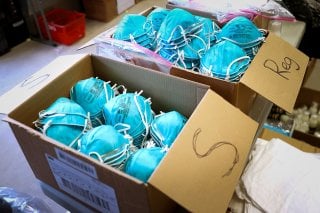 FILE PHOTO: Boxes of N95 protective masks for use by medical field personnel are seen at a New York State emergency operations incident command center during the coronavirus outbreak in New Rochelle, New York, U.S., March 17, 2020. REUTERS/Mike Segar/File