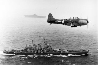 US Navy Douglas SBD Dauntless flying patrol in World War II. Photo by US Navy.