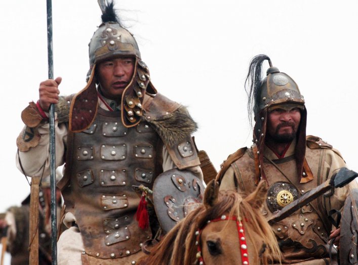 Horse-mounted members of the Mongolian Armed Forces honor their warrior heritage during the opening ceremony of exercise Khaan Quest, Five Hills Training Center, Mongolia. 1 Aug 2007. (Official U. S. Marine Corps photo by Sgt. G. S. Thomas)