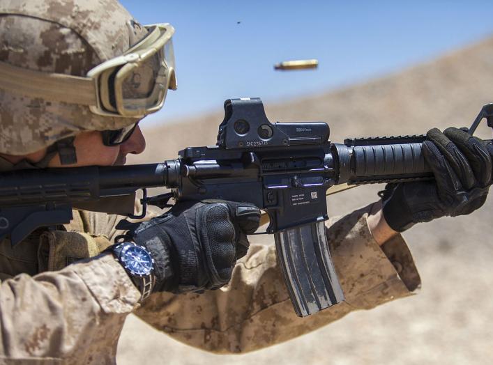 Jordan - A 26th Marine Expeditionary Unit (MEU) Maritime Raid Force Marine fires an M4 Carbine at a range in Jordan, June 19, 2013. Exercise Eager Lion 2013 is an annual, multinational exercise designed to strengthen military-to-military relationships and