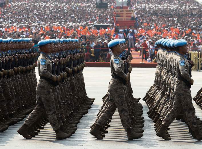 Chinese peacekeeping troops march in formation past Tiananmen Square during the military parade marking the 70th founding anniversary of People's Republic of China, on its National Day in Beijing, China October 1, 2019. REUTERS/Thomas Peter