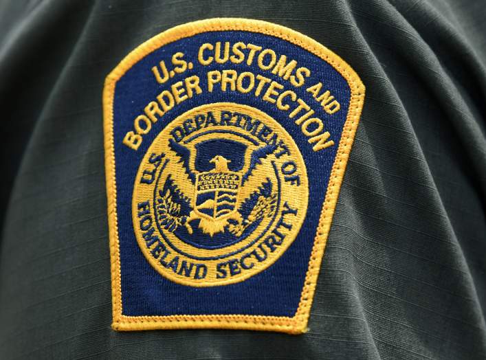 FILE PHOTO: A U.S. Customs and Border Protection patch is seen on the arm of a U.S. Border Patrol agent in Mission, Texas, U.S., July 1, 2019. REUTERS/Loren Elliott/File Photo