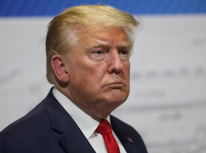 U.S. President Donald Trump pauses in front of a diagram while touring the Ford Rawsonville Components Plant, which is making ventilators and medical supplies, during the coronavirus disease (COVID-19) pandemic in Ypsilanti, Michigan, U.S., May 21, 2020. 