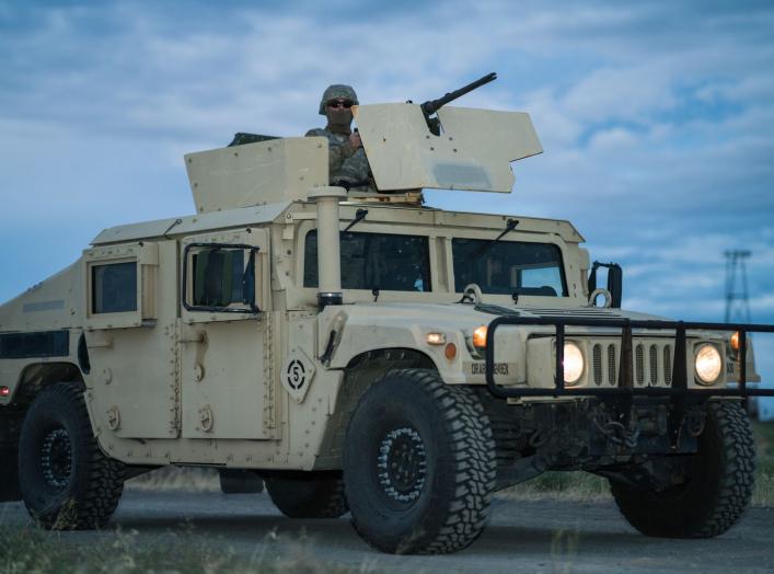 https://www.dvidshub.net/image/5536636/soldier-controls-50-cal-machine-during-perimeter-defense-exercise