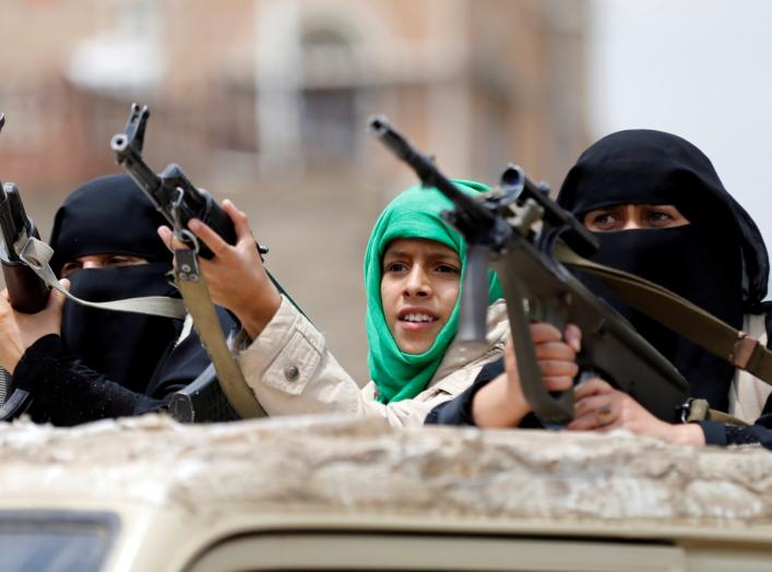 Armed women loyal to the Houthi movement ride on the back of a truck as they take part in a parade to show support for the movement in Sanaa, Yemen September 6, 2016. REUTERS/Khaled Abdullah