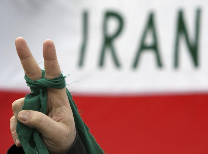 An Iranian citizen living in Hungary attends a demonstration in Budapest organised by Amnesty International to protest against what the protesters say are human rights violations in Iran March 10, 2010. REUTERS/Karoly Arvai