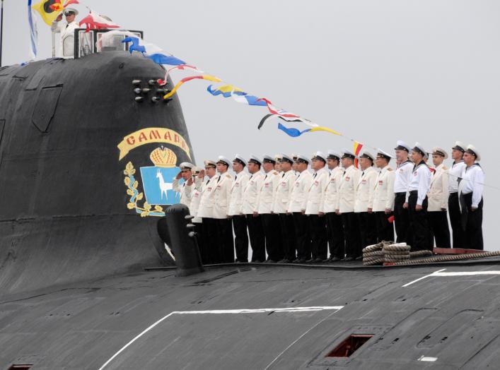 The crew of Russia's Akula-class nuclear-powered attack submarine Samara line up on its deck during a naval parade rehearsal at the harbour of Russia's far eastern city of Vladivostok, July 23, 2010.