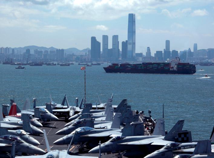 Fighter jets are seen on the deck of U.S. carrier USS George Washington as it stations off Hong Kong waters during a routine port visit to the territory July 10, 2012. REUTERS/Bobby Yip