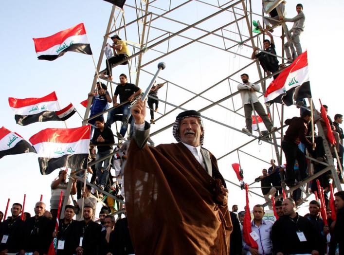 A supporter of Shi'ite cleric Moqtada al-Sadr takes part in a rally, which the participants said was against sectarianism and injustice, in Kut, 150 km (93 miles) southeast of Baghdad, March 16, 2013. REUTERS/Wissm al-Okili (IRAQ - Tags: CIVIL UNREST TPX 