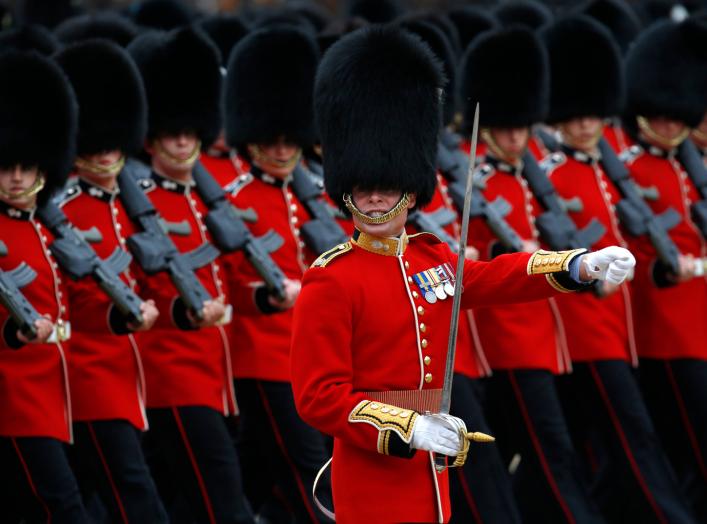 Guardsmen of the Grenadier Guards parade during the Trooping the Colour ceremony at Horse Guards Parade in London June 14, 2014. Trooping the Colour is a ceremony to honour the Queen's official birthday. REUTERS/Luke MacGregor