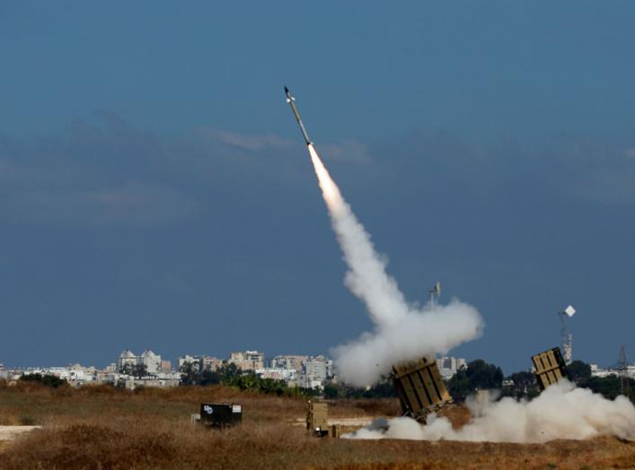 An Iron Dome launcher fires an interceptor rocket in the southern Israeli city of Ashdod July 9, 2014. At least two rockets fired from the Gaza Strip at Tel Aviv on Wednesday were shot down mid-air by Israel's Iron Dome defense system, the Israeli militar