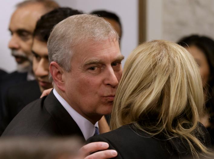 Britain's Prince Andrew greets a business leader during a reception at the sideline of the World Economic Forum in Davos January 22, 2015. REUTERS/Michel Euler/Pool 