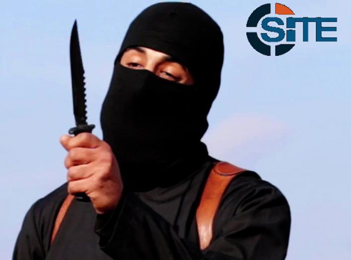 A masked, black-clad militant, who has been identified by the Washington Post newspaper as a Briton named Mohammed Emwazi, brandishes a knife in this still image from a 2014 video obtained from SITE Intel Group February 26, 2015.