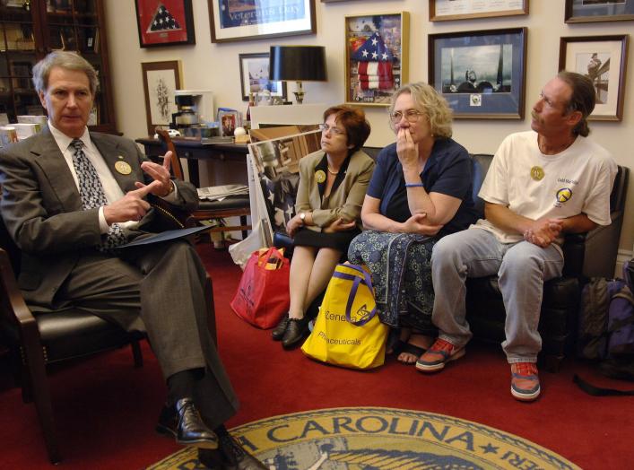 U.S. Representative Walter Jones (L) (R-NC), meets with Gold Star and Military Families in his Capitol Hill office in Washington, D.C., June 15, 2005. Seated are (L-R) Dianne Davis Santorello, mother of Lt. Neil Santorello; Celeste Zappala, mother of Sgt.