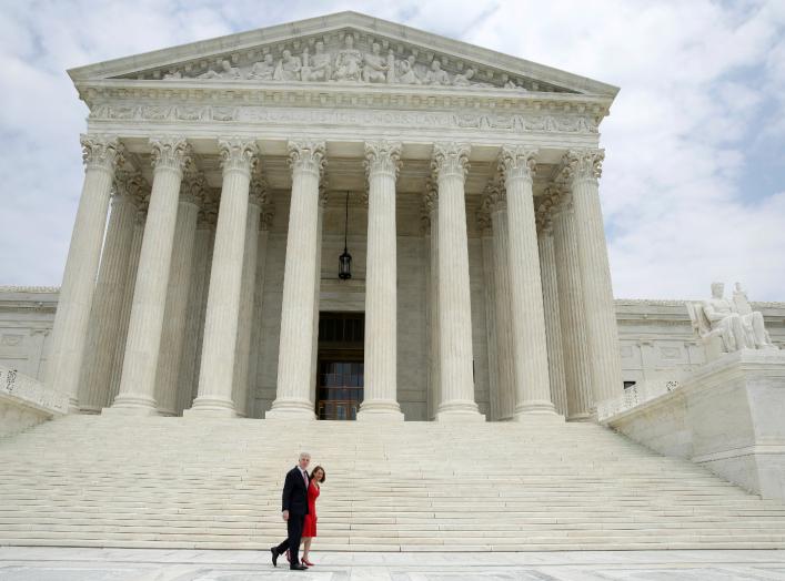 Associate Justice Neil Gorsuch walks his wife Louise during his investiture ceremony at the Supreme Court in Washington, U.S., June 15, 2017. REUTERS/Joshua Roberts