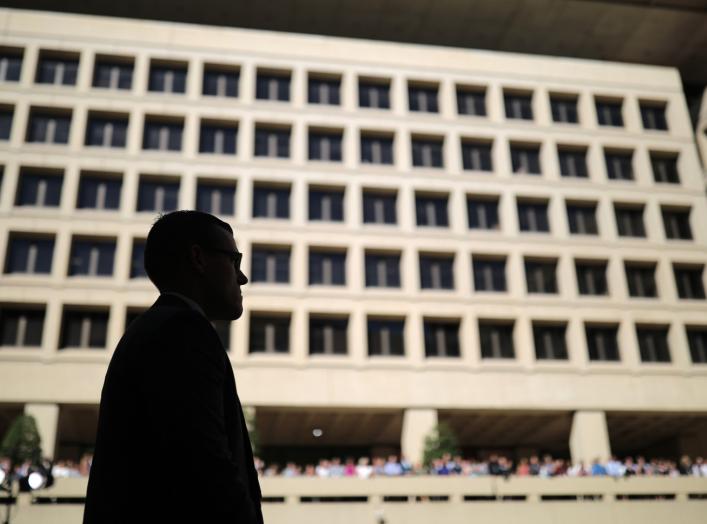 Federal Bureau of Investigation agents and employees listen to incoming FBI Director Christopher Wray speak after taking the oath of office at FBI headquarters in Washington, U.S., September 28, 2017. REUTERS/Carlos Barria